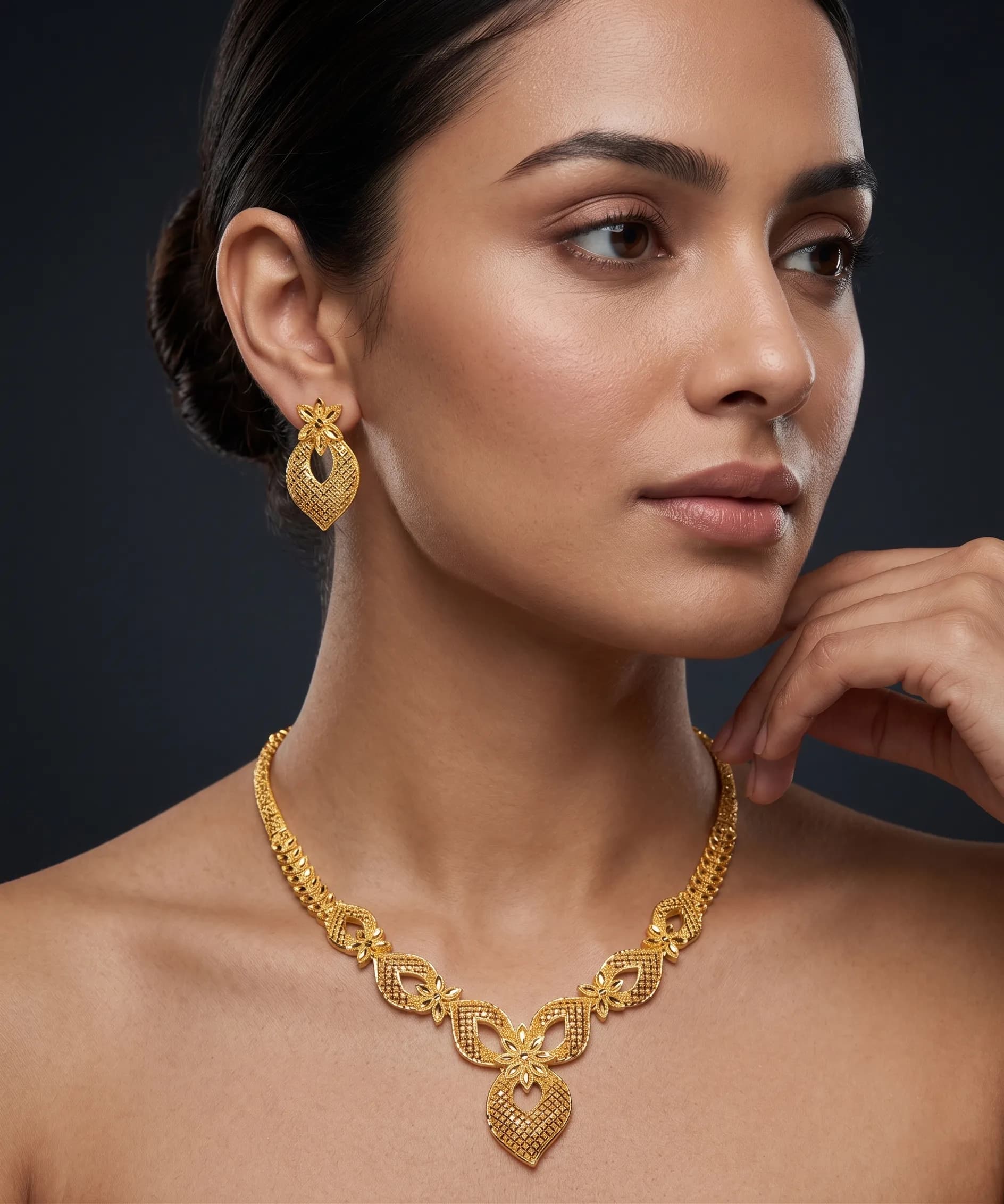 Gold beaded necklace and earrings