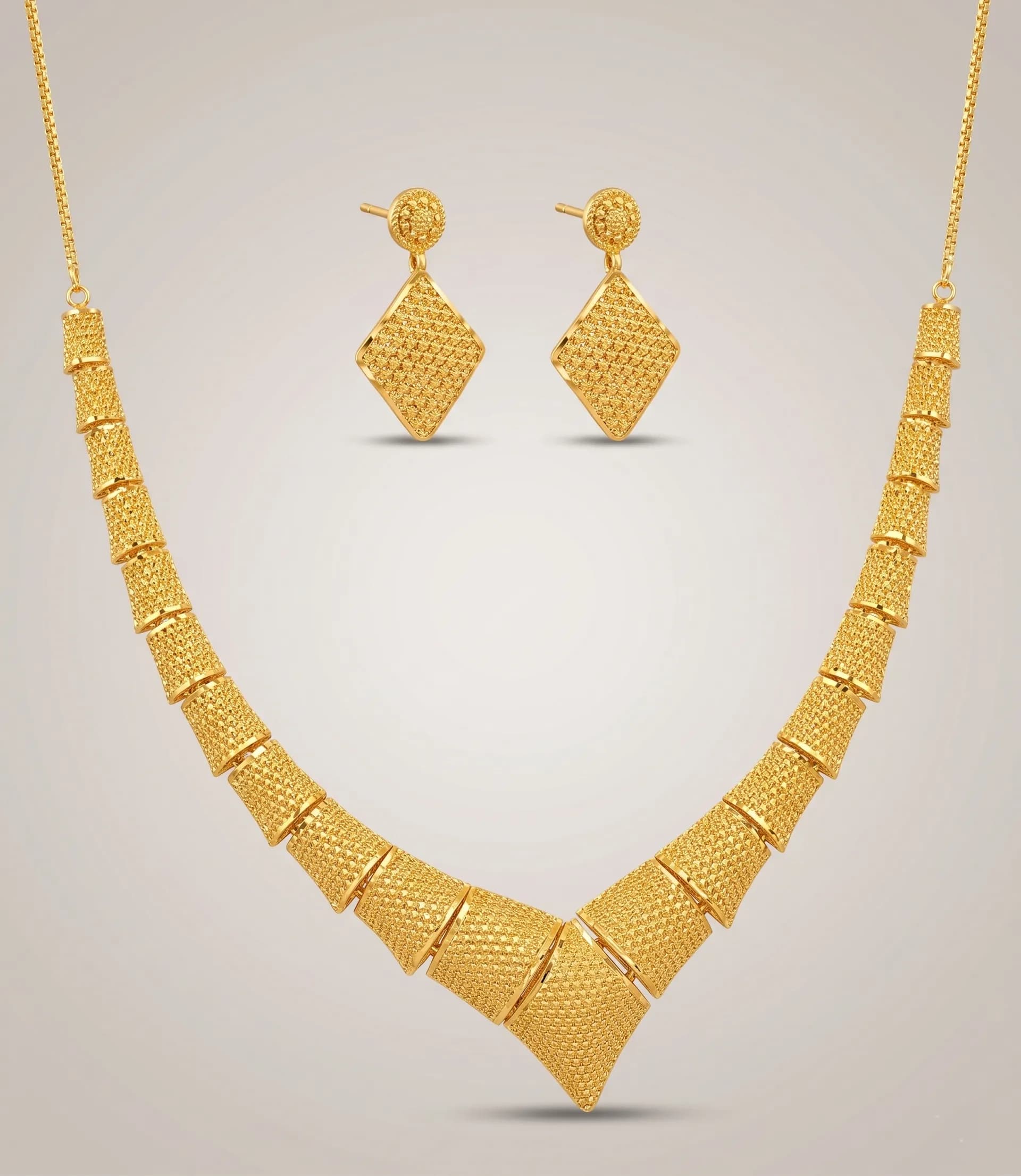 V-shape gold necklace and earrings